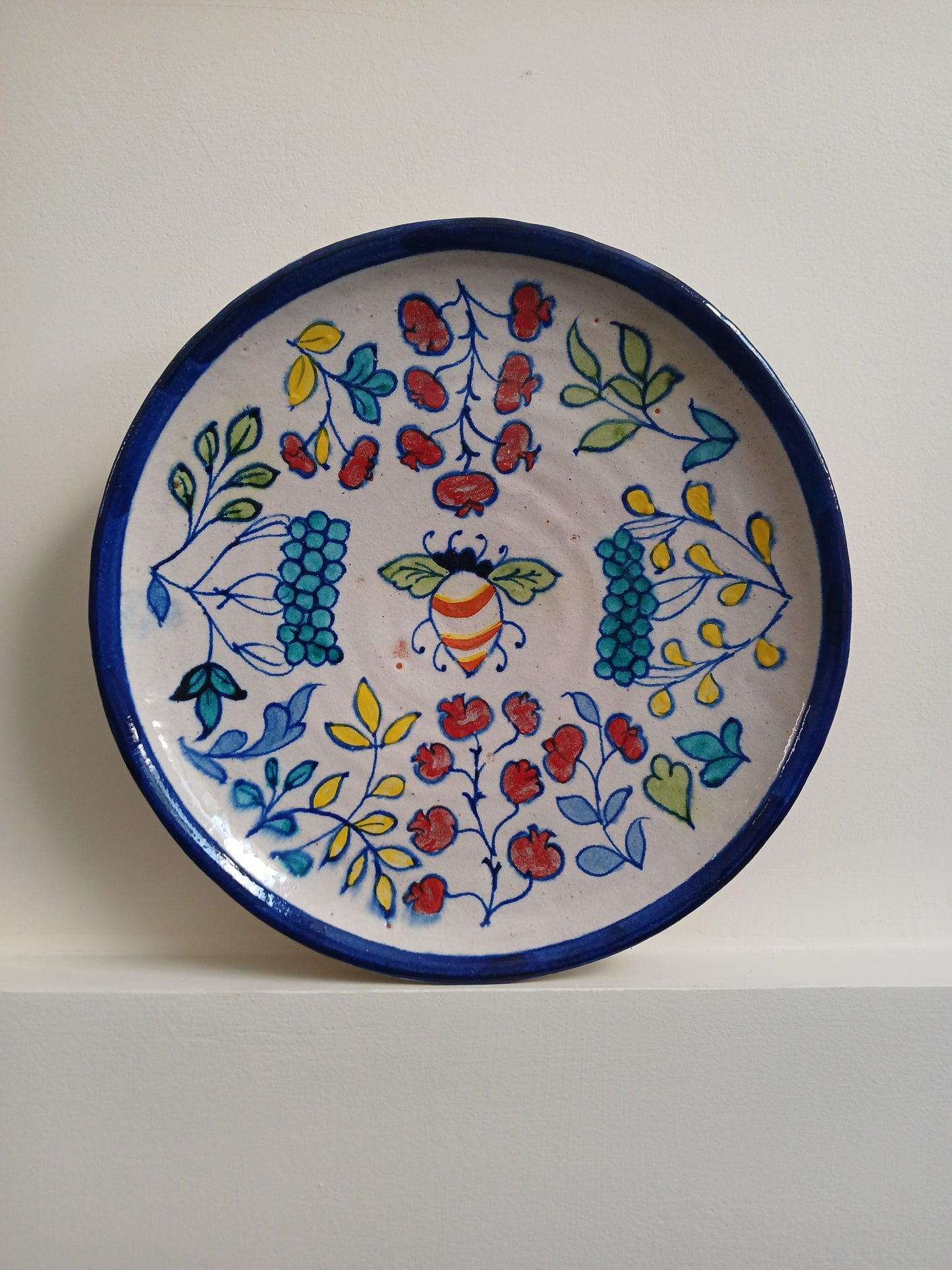 Hand-painted Ceramic Plate with Bee and Floral Motifs